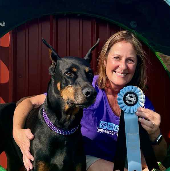 Doberman posing with Deb